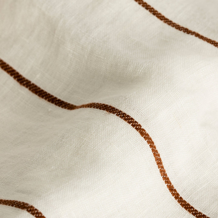 A close up of Cedar Stripe linen fabric. Sizes: Double, Queen, King, Super King