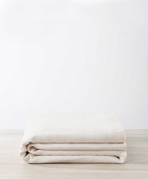 Bedroom Edit - Sky & Ivory folded premium linen bedding showcasing natural texture and sustainable quality The beauty of home