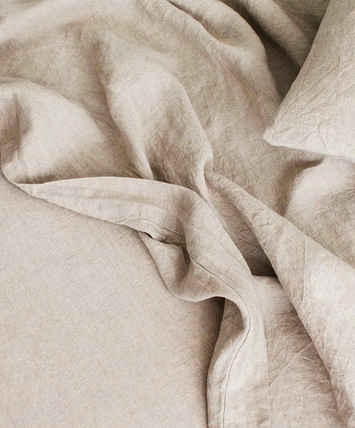 A close up of the linen flat sheet with border. 