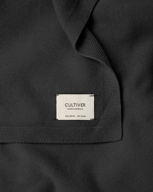 files/CULTIVER_100__ZQ_Merino_Wool_Blanket_SLATE-Label.jpg
