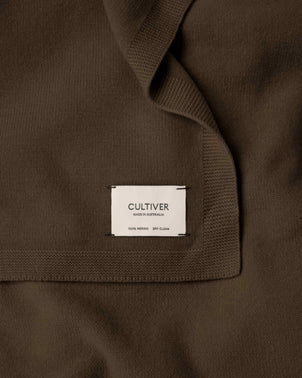 files/CULTIVER_100__ZQ_Merino_Wool_Blanket_TRUFFLE_-_Label.jpg