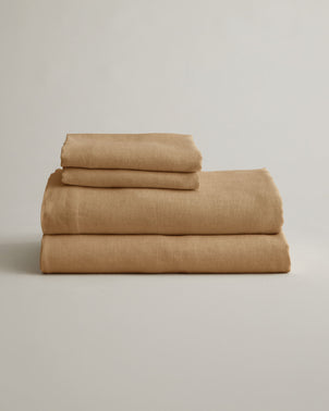 files/Copy_of_Sheet_Set_Sky_SAND_on_Bed_2.jpg