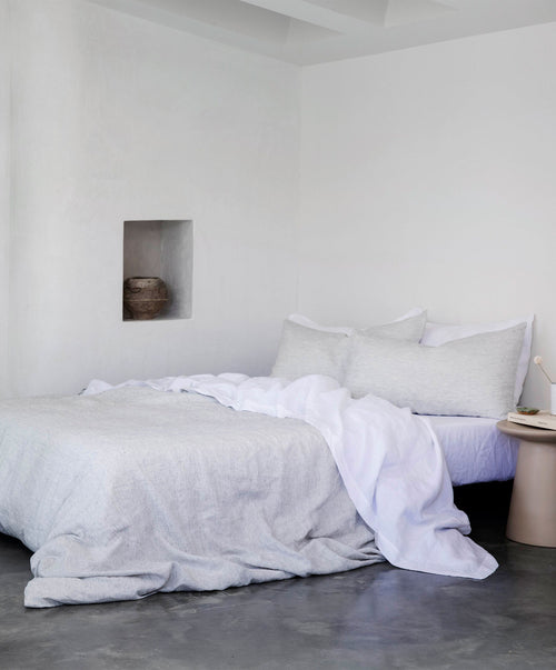 Bedroom Edit - White & Pinstripe bed linen in soft natural tones with breathable linen fabric The beauty of home