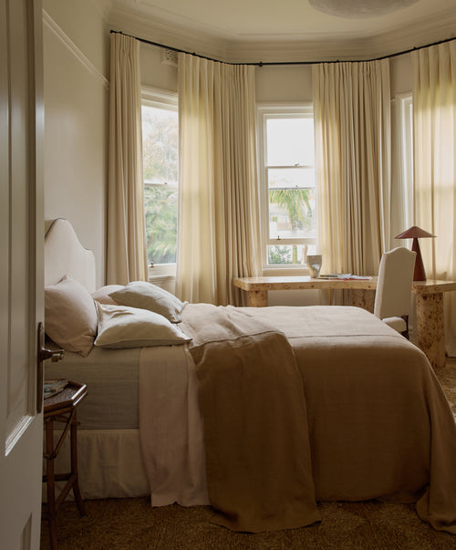 Bedroom Edit - Sand, Blush & Natural linen bedding in a sunlit room with soft natural tones The beauty of home