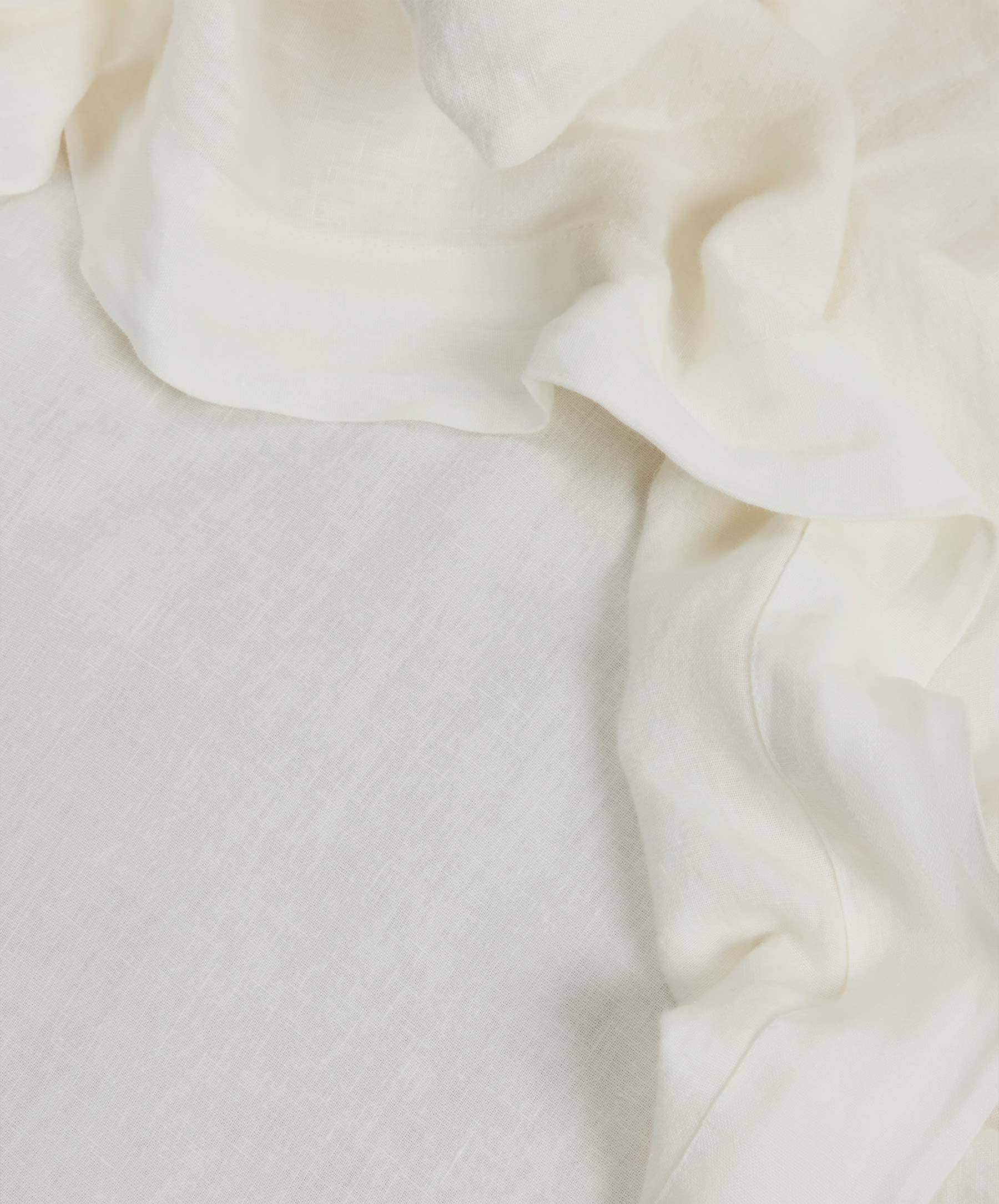 Complimentary Swatch Card - Ivory showing soft natural linen fabric with breathable texture The beauty of home