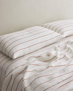 files/Pillowcases_Cedar_Stripe_Styled_on_Bed_1.jpg