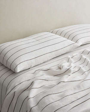 files/Pillowcases_Truffle_Stripe_Styled_on_Bed_1.jpg