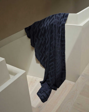 files/Rolfes_Throw_Navy_01_384f254c-39ce-4f5e-99f3-65d71e030dd8.jpg