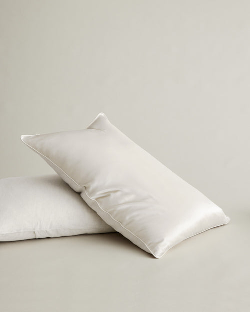Silk Linen Flip Pillowcase - Ivory styled on layered bedding in a neutral setting