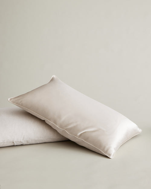 Silk Linen Flip Pillowcase - Smoke styled on layered bedding in a neutral bedroom