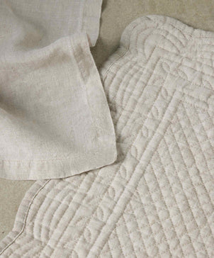 files/scallop_placemat_napkin_natural_web.jpg