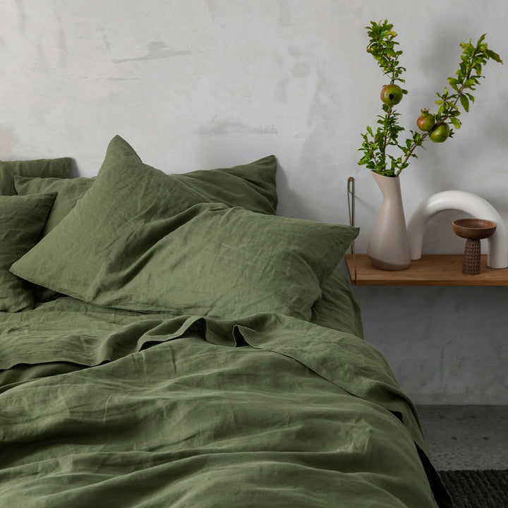 A bed dressed in Forest