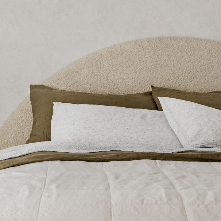 A cream bed dressed in Olive, Pinstripe and Natural bed linen. Size: Single, Double, Queen, King