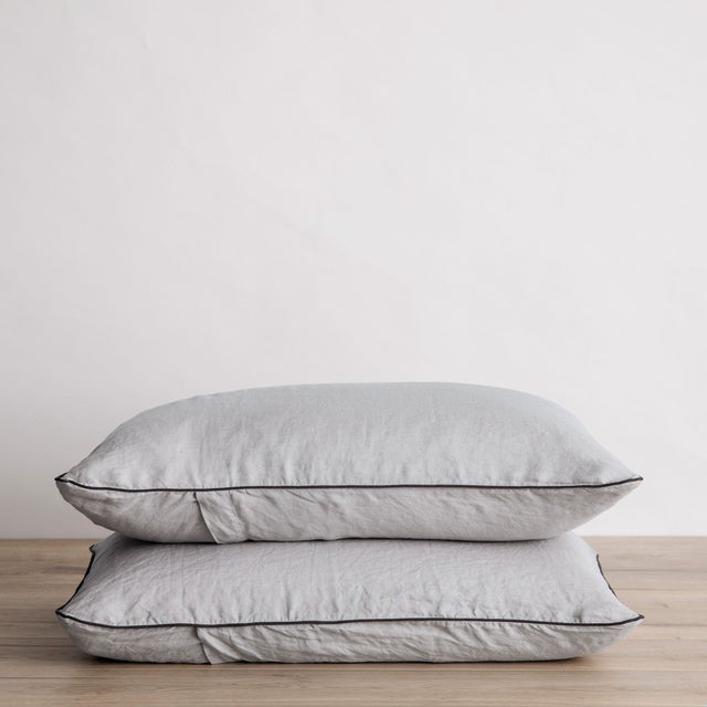 Set of Piped Linen Pillowcases in Smoke Grey and Slate. Size: Standard, King